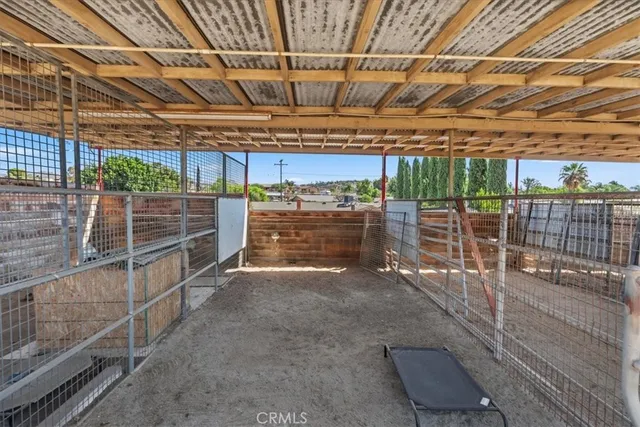 a view of a patio with couches near a patio