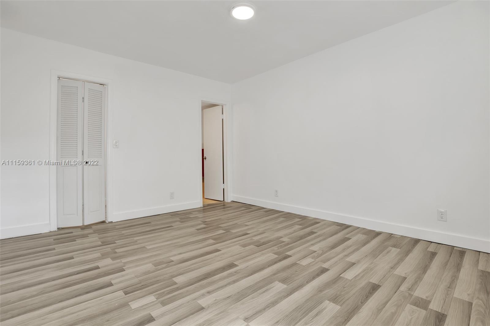8408 West Sample Road, Unit 218 Coral Springs, FL 33065 - Photo 16 of 25 Primary room