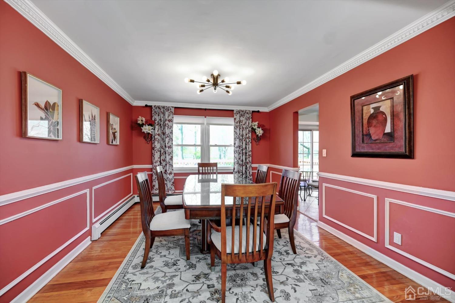481 Plainfield Road Edison, NJ 08820 - Photo 12 of 42 a view of a dining room with furniture window and wooden floor
