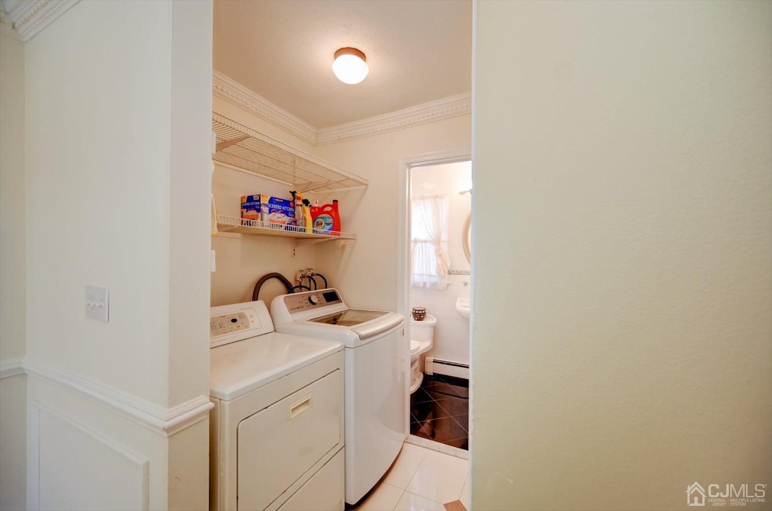 481 Plainfield Road Edison, NJ 08820 - Photo 18 of 42 a utility room with dryer and washer