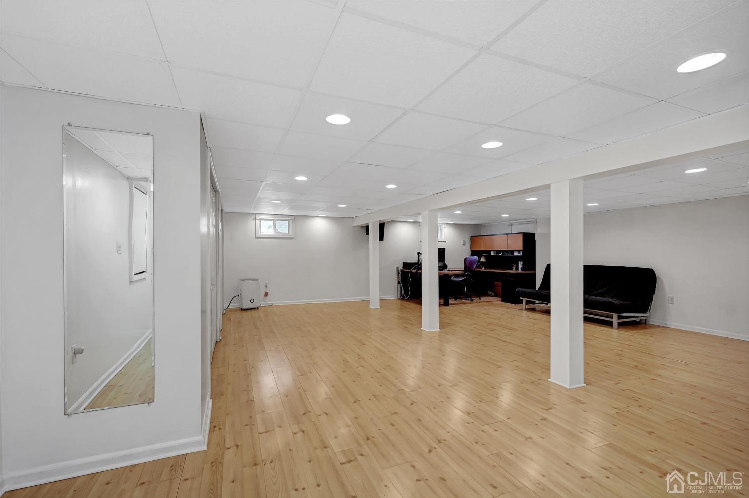 481 Plainfield Road Edison, NJ 08820 - Photo 20 of 42 a view of a hallway with wooden floor
