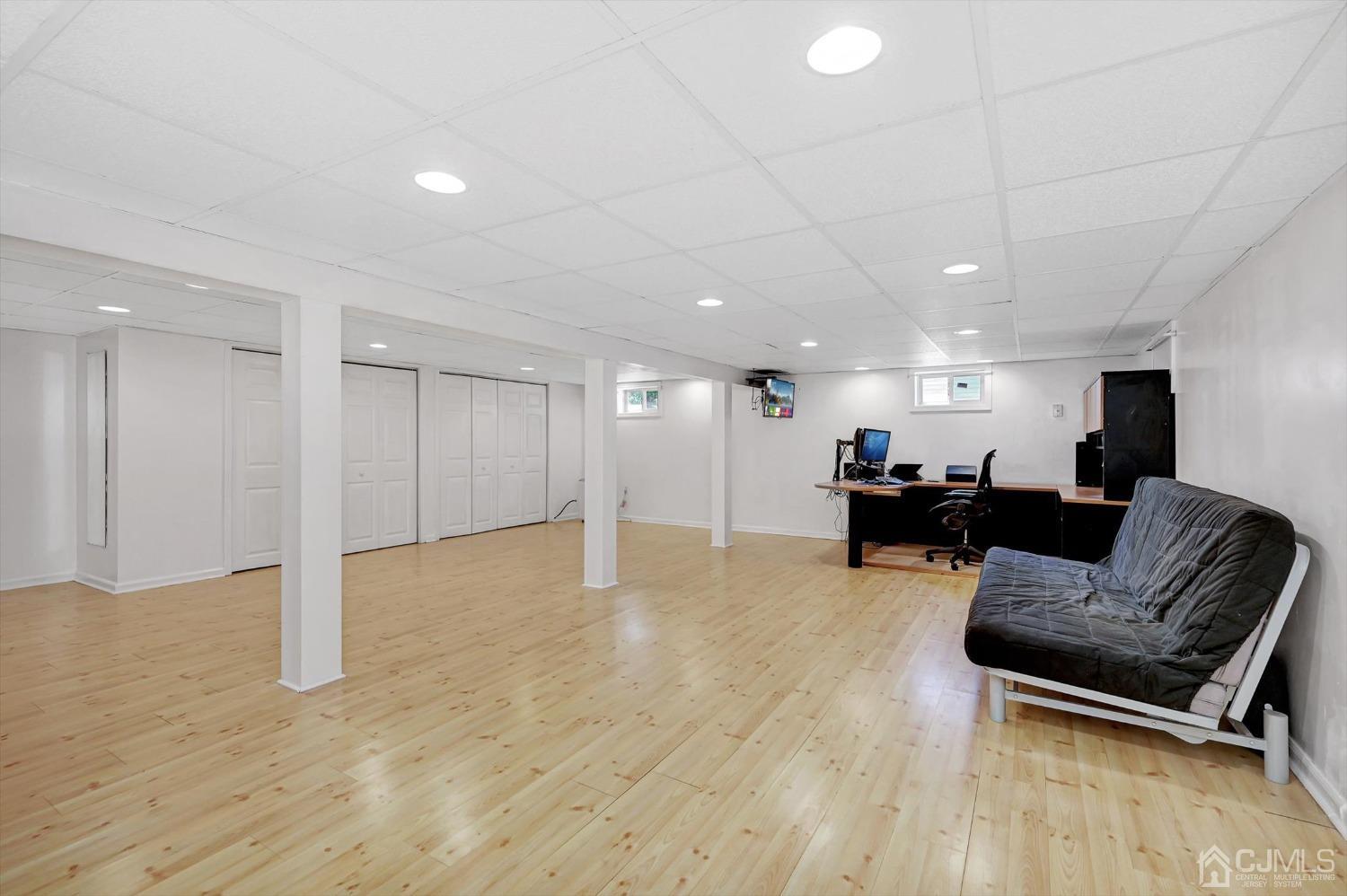 481 Plainfield Road Edison, NJ 08820 - Photo 21 of 42 a living room with furniture and a wooden floor