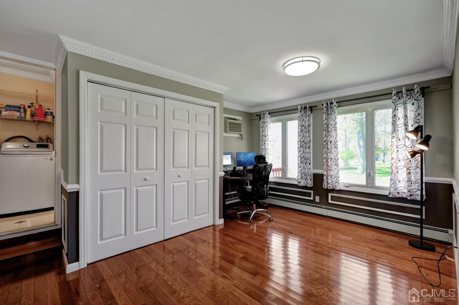 481 Plainfield Road Edison, NJ 08820 - Photo 38 of 42 a view of a room wooden floor and furniture