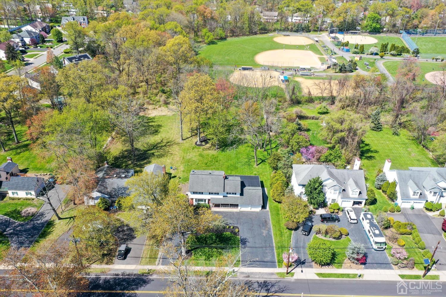481 Plainfield Road Edison, NJ 08820 - Photo 5 of 42 an aerial view of a house with yard swimming pool and outdoor seating