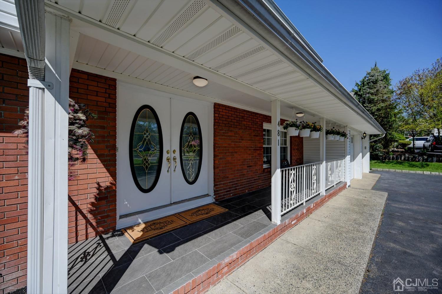 481 Plainfield Road Edison, NJ 08820 - Photo 6 of 42 a view of a house with car parked on the road