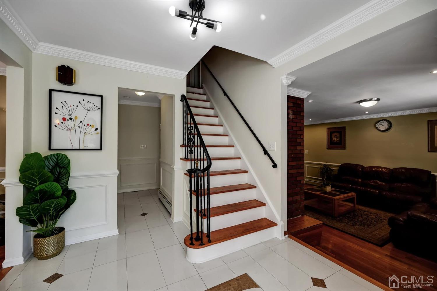 481 Plainfield Road Edison, NJ 08820 - Photo 7 of 42 a living room with furniture and a potted plant