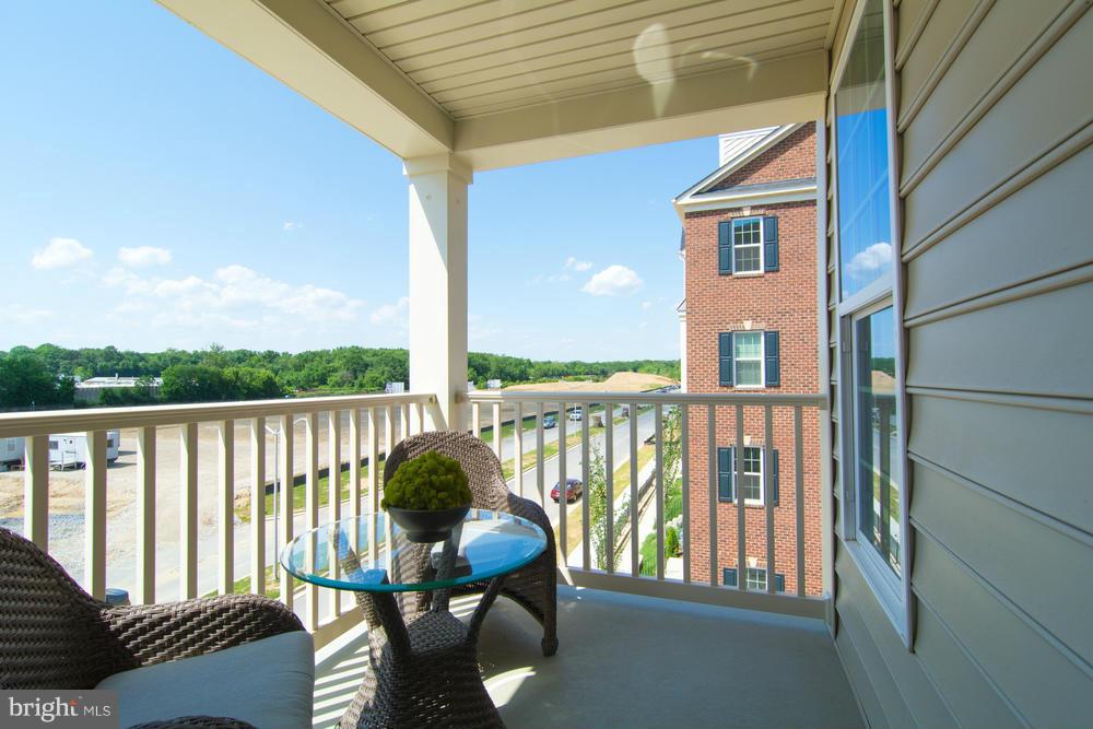 8011 Orchard Grove Road, Unit 820 Odenton, MD 21113 - Photo 7 of 30 a view of balcony with furniture