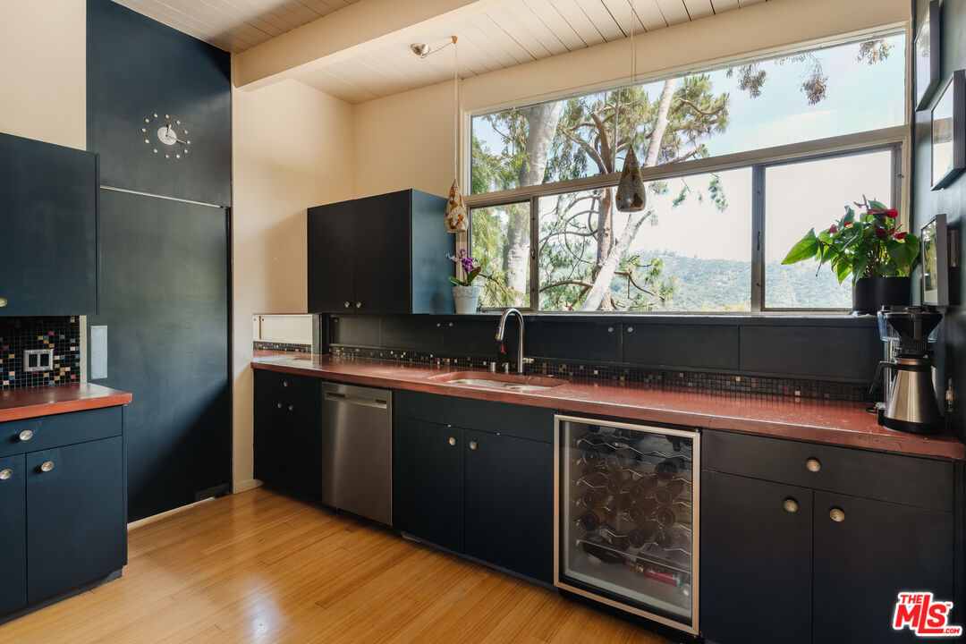2980 Edgewick Road Glendale, CA 91206 - Photo 14 of 34 a kitchen with a sink and large window