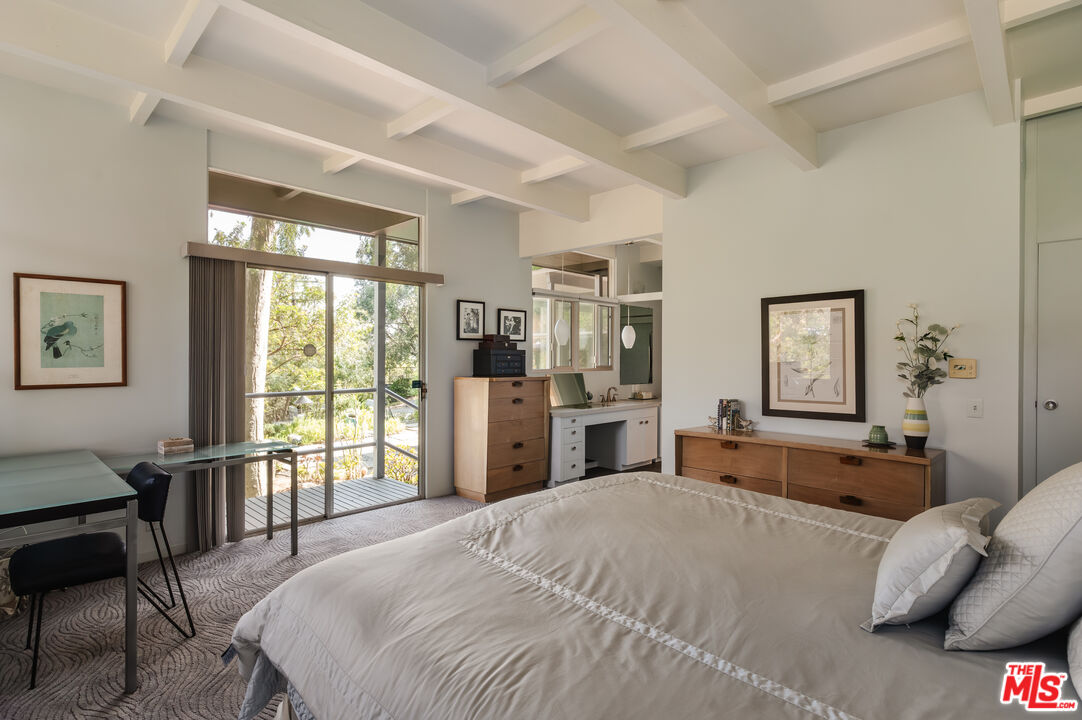 2980 Edgewick Road Glendale, CA 91206 - Photo 17 of 34 a bed room with a bed and a large window