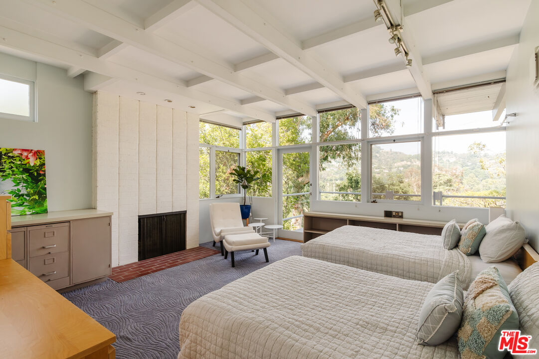 2980 Edgewick Road Glendale, CA 91206 - Photo 19 of 34 a bedroom with a bed and a window