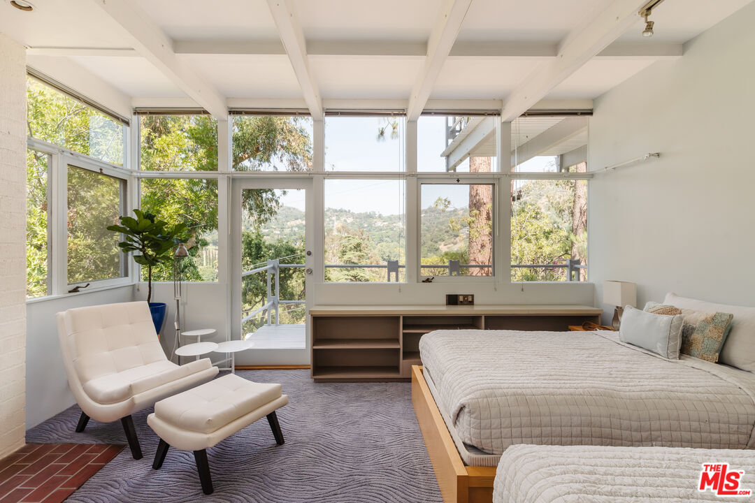 2980 Edgewick Road Glendale, CA 91206 - Photo 20 of 34 a bedroom with a bed and a large window