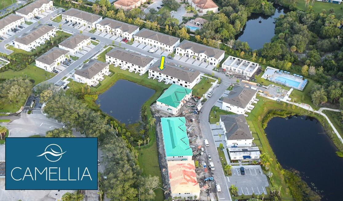 276 Southwest Sally Way, Unit LATITUDE 6613 Stuart, FL 34997 - Photo 2 of 22 an aerial view of a house