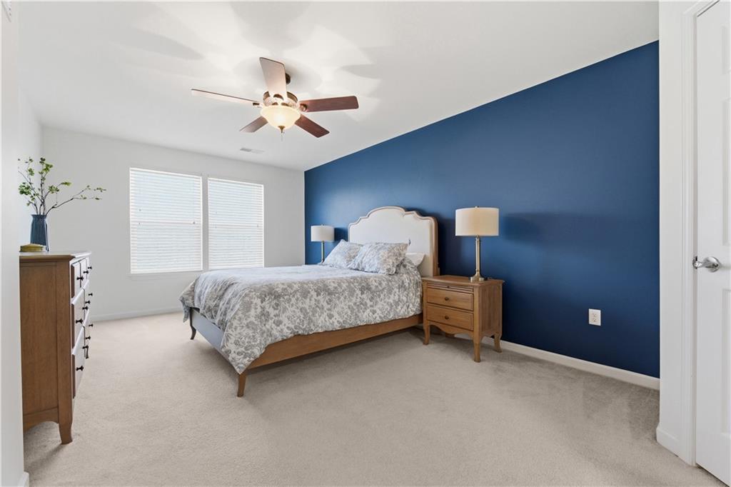 155 Broadstone Drive Mars, PA 16046 - Photo 15 of 30 a bedroom with a bed and a chandelier
