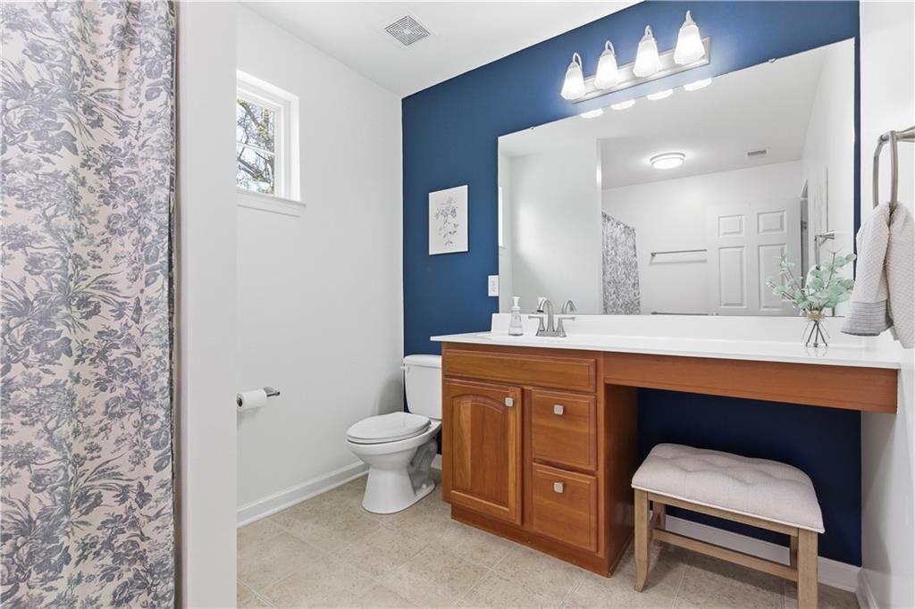 155 Broadstone Drive Mars, PA 16046 - Photo 16 of 30 a spacious bathroom with a toilet sink double vanity and mirror