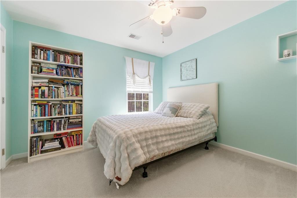 155 Broadstone Drive Mars, PA 16046 - Photo 17 of 30 a bed room with a bed and a book shelf