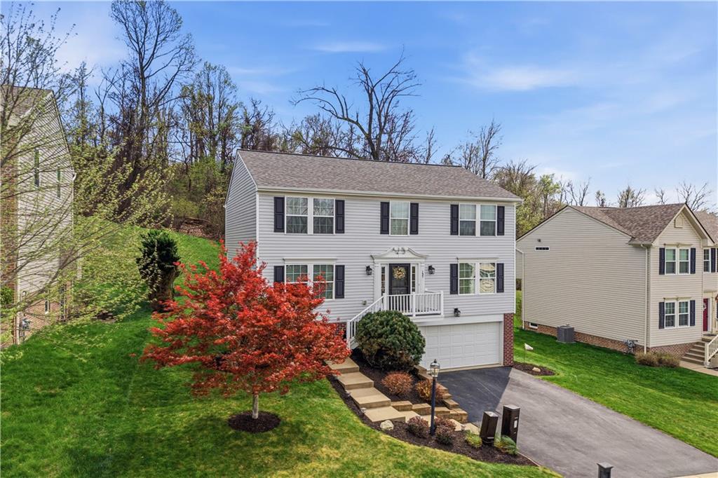 155 Broadstone Drive Mars, PA 16046 - Photo 2 of 30 a front view of a house with garden
