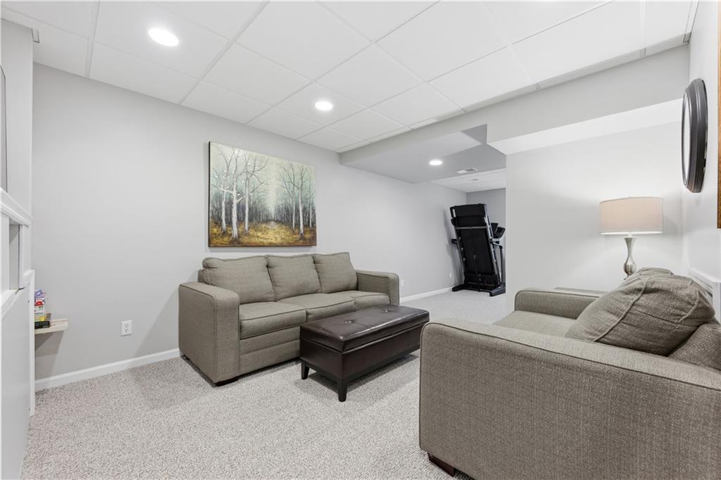 155 Broadstone Drive Mars, PA 16046 - Photo 21 of 30 a living room with furniture and a lamp