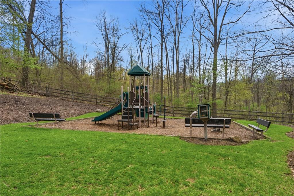 155 Broadstone Drive Mars, PA 16046 - Photo 30 of 30 a view of a park with swings and a bench