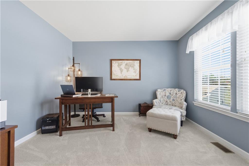 155 Broadstone Drive Mars, PA 16046 - Photo 5 of 30 a view of a workspace with a window and lounge chair
