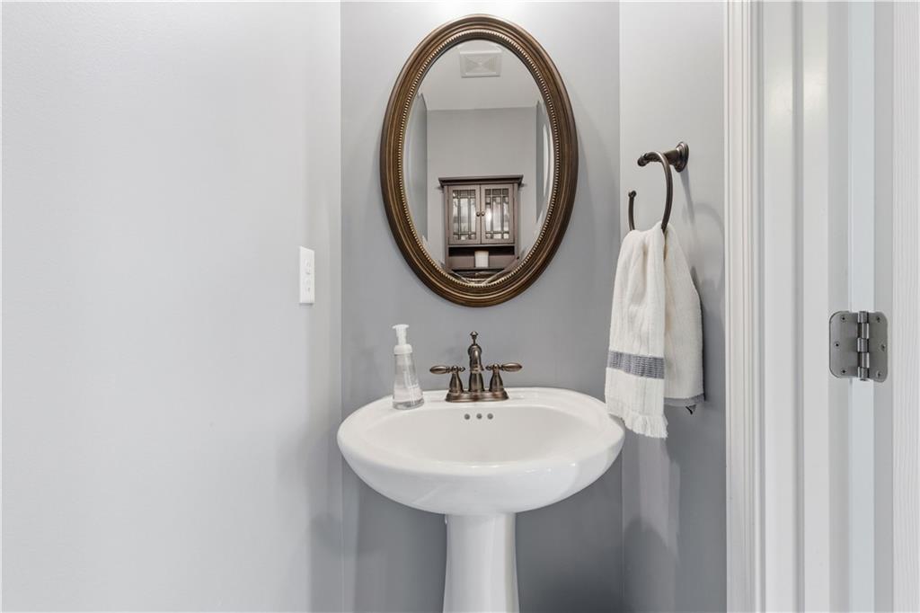 155 Broadstone Drive Mars, PA 16046 - Photo 6 of 30 a bathroom with a sink and a mirror