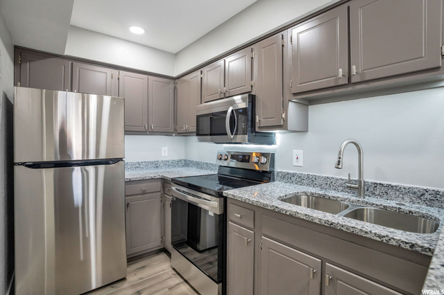 290 North 500 West, Unit 204 Bountiful, UT 84010 - Photo 1 of 1 Kitchen with All New Stainless Steel Appliances & New Granite Countertops