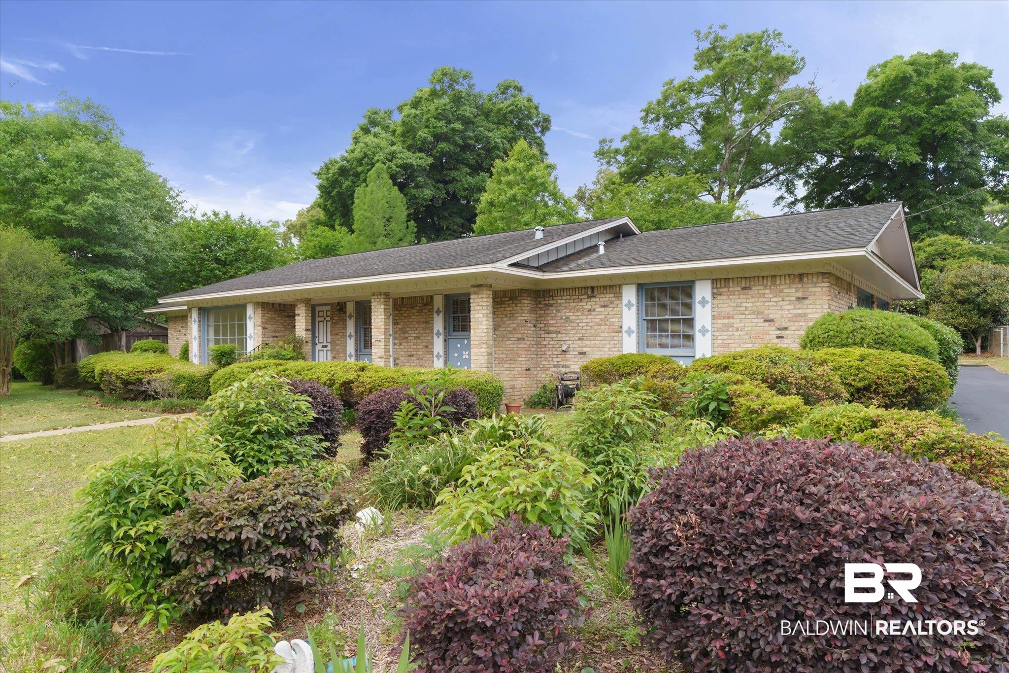 1182 Ginger Drive Mobile, AL 36693 - Photo 36 of 37 Brick exterior with a gabled roofline and covered front entry