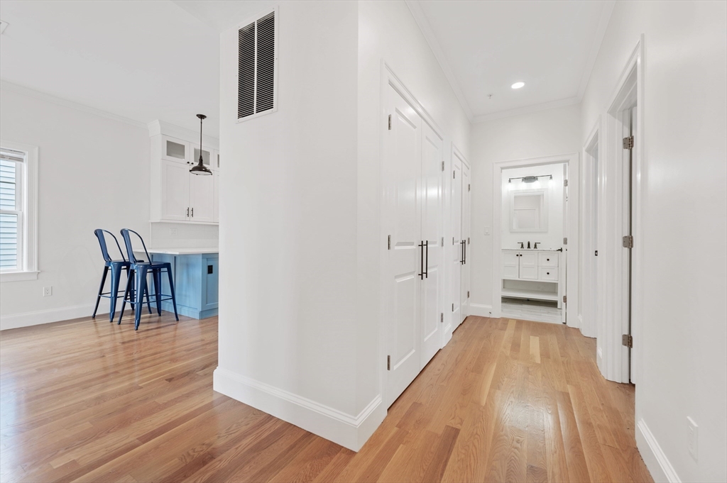 6 Marie Street, Unit 3 Boston, MA 02122 - Photo 16 of 25 a view of a livingroom with furniture and wooden floor