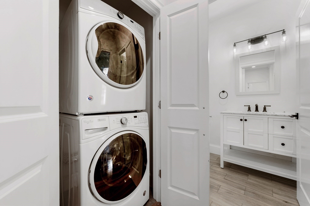 6 Marie Street, Unit 3 Boston, MA 02122 - Photo 17 of 25 a utility room with dryer and washer