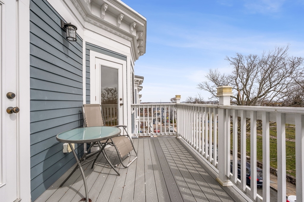 6 Marie Street, Unit 3 Boston, MA 02122 - Photo 20 of 25 a view of a balcony with chairs