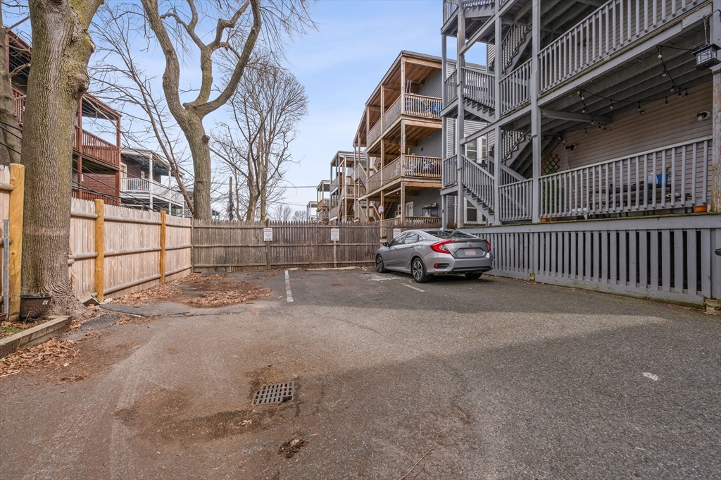 6 Marie Street, Unit 3 Boston, MA 02122 - Photo 25 of 25 a car parked on the side of the road