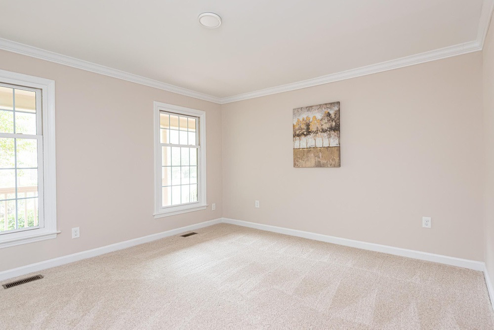 1701 Pony Run Road Raleigh, NC 27615 - Photo 14 of 30 First Floor Bedroom with double windows and nice sized closet First Floor Guest Bedroom