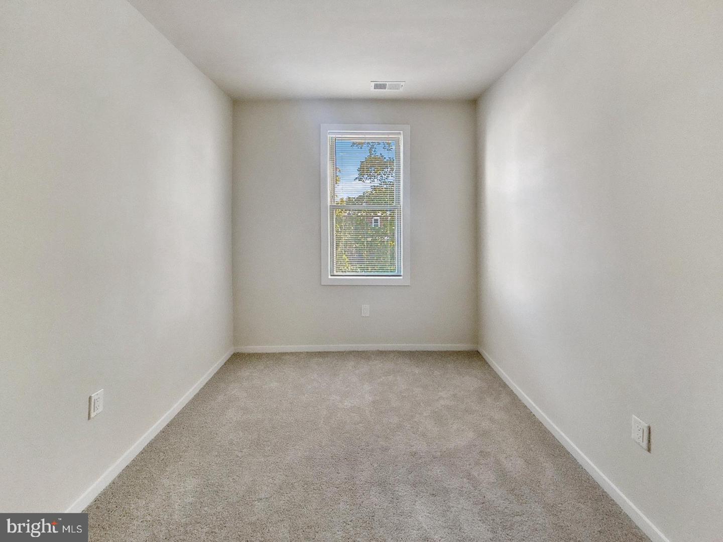 2306 Wichita Avenue Baltimore, MD 21215 - Photo 14 of 18 an empty room with a window