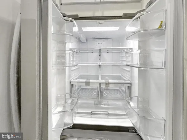 a view of a room with racks on the wall