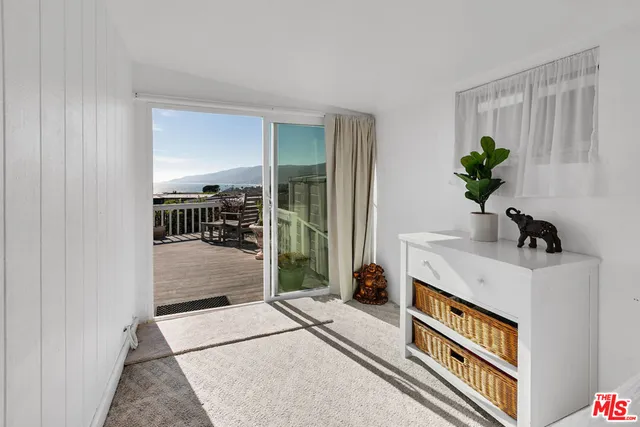 a living room with a rug