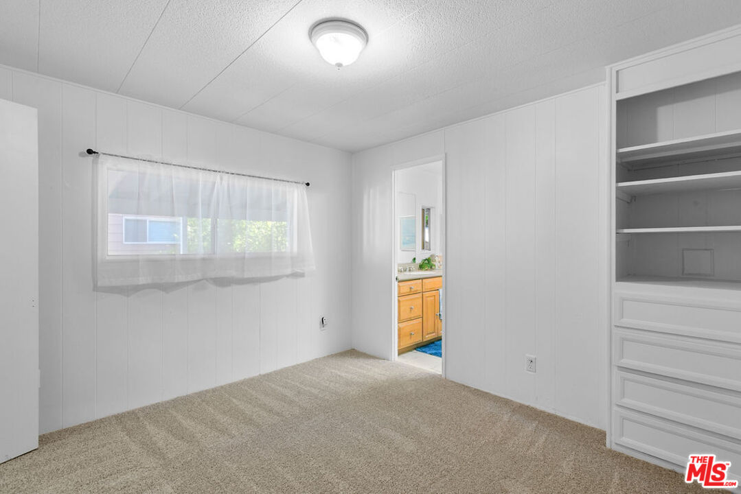 29500 Heathercliff Road, Unit 252 Malibu, CA 90265 - Photo 31 of 65 an empty room with a empty space and windows