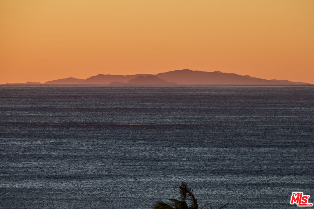 29500 Heathercliff Road, Unit 252 Malibu, CA 90265 - Photo 42 of 65 a view of a yard with a house