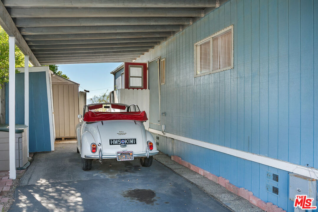 29500 Heathercliff Road, Unit 252 Malibu, CA 90265 - Photo 48 of 65 a white car parked in front of a house