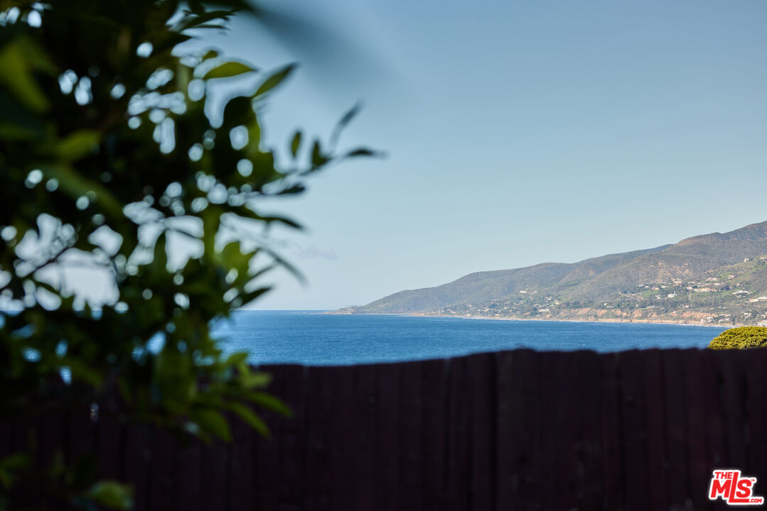 29500 Heathercliff Road, Unit 252 Malibu, CA 90265 - Photo 6 of 65 a view of a lake with a mountain