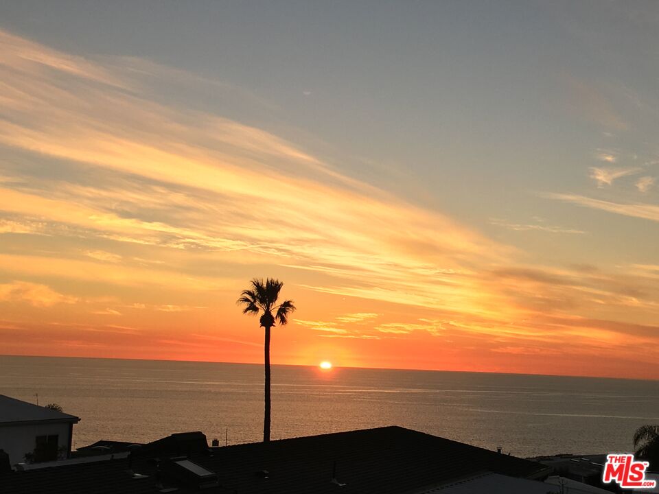 29500 Heathercliff Road, Unit 252 Malibu, CA 90265 - Photo 7 of 65 a view of a ocean from a balcony
