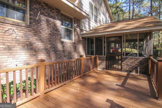 a view of a chairs on the deck