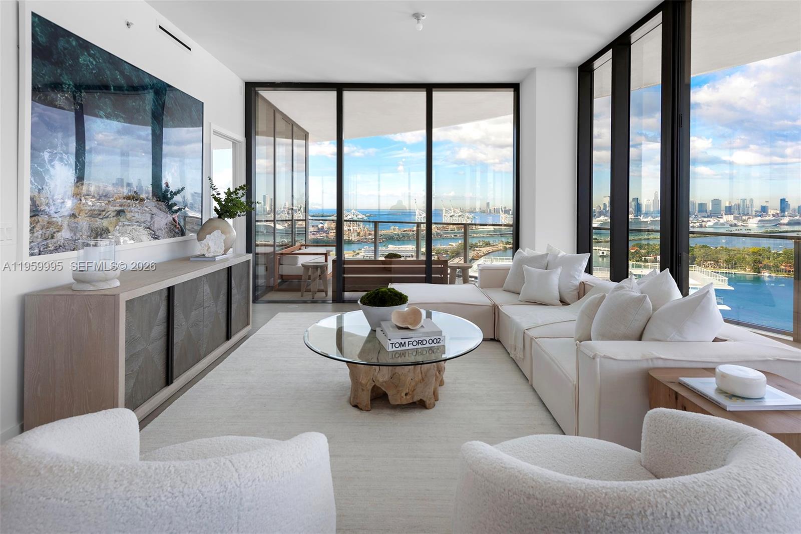 500 Alton Road, Unit 2903 Miami Beach, FL 33139 - Photo 16 of 52 a living room with furniture and a large window