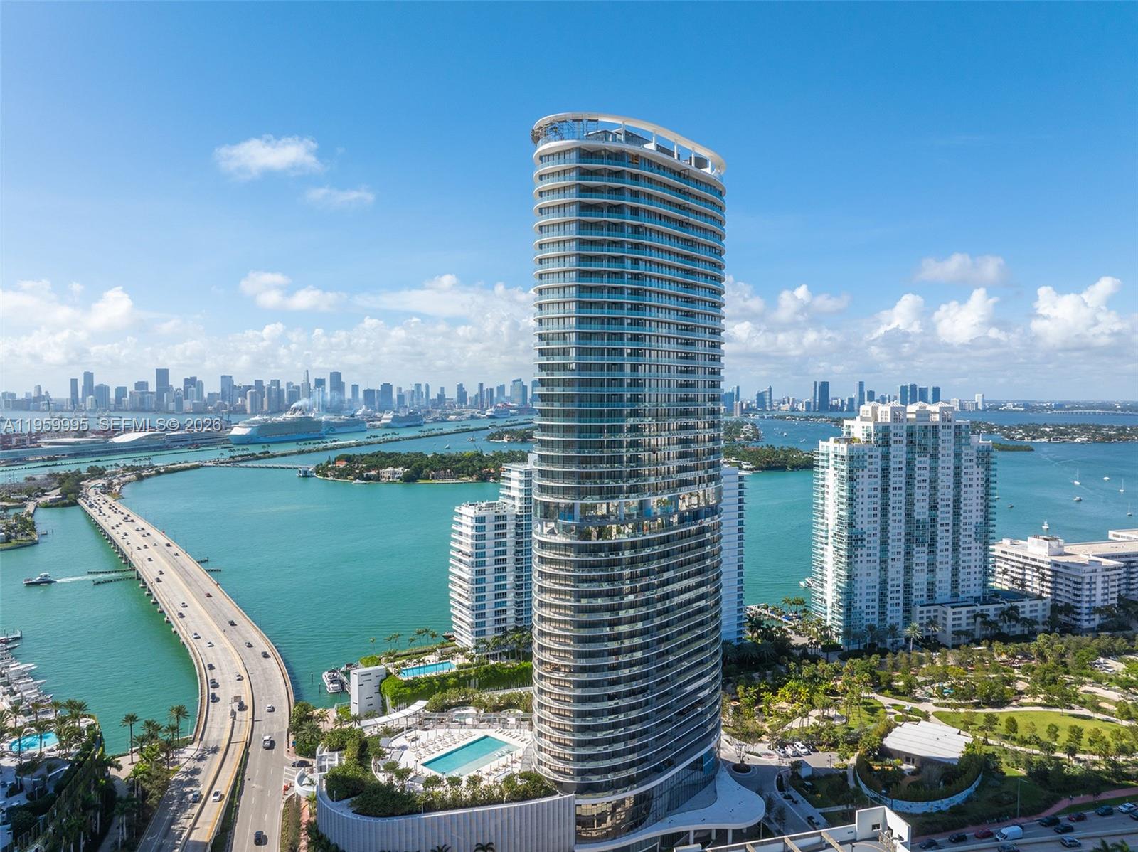 500 Alton Road, Unit 2903 Miami Beach, FL 33139 - Photo 2 of 52 a view of a lake with tall buildings
