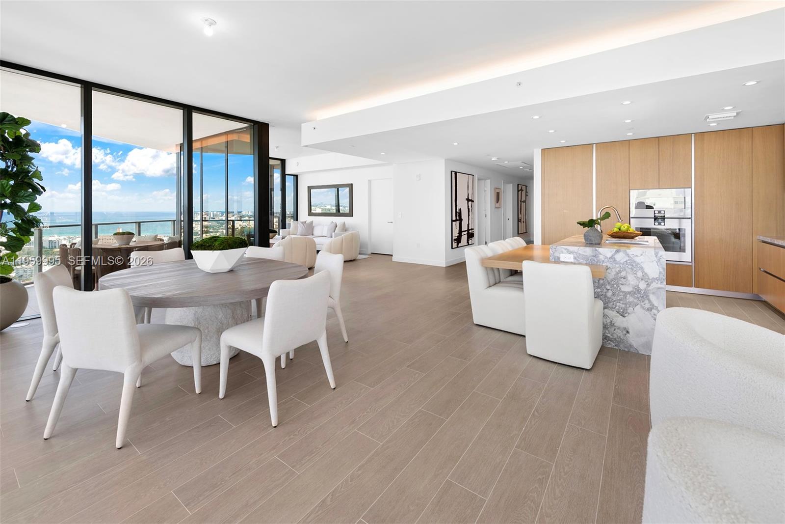 500 Alton Road, Unit 2903 Miami Beach, FL 33139 - Photo 21 of 52 a living room with fireplace furniture and a large window