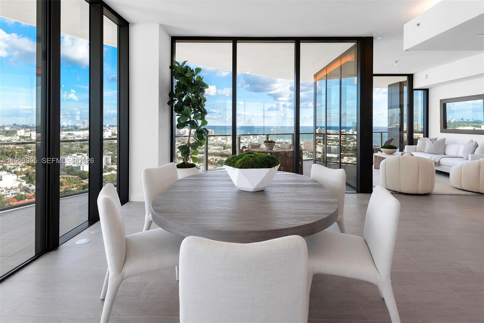500 Alton Road, Unit 2903 Miami Beach, FL 33139 - Photo 22 of 52 a view of a dining room with furniture and window