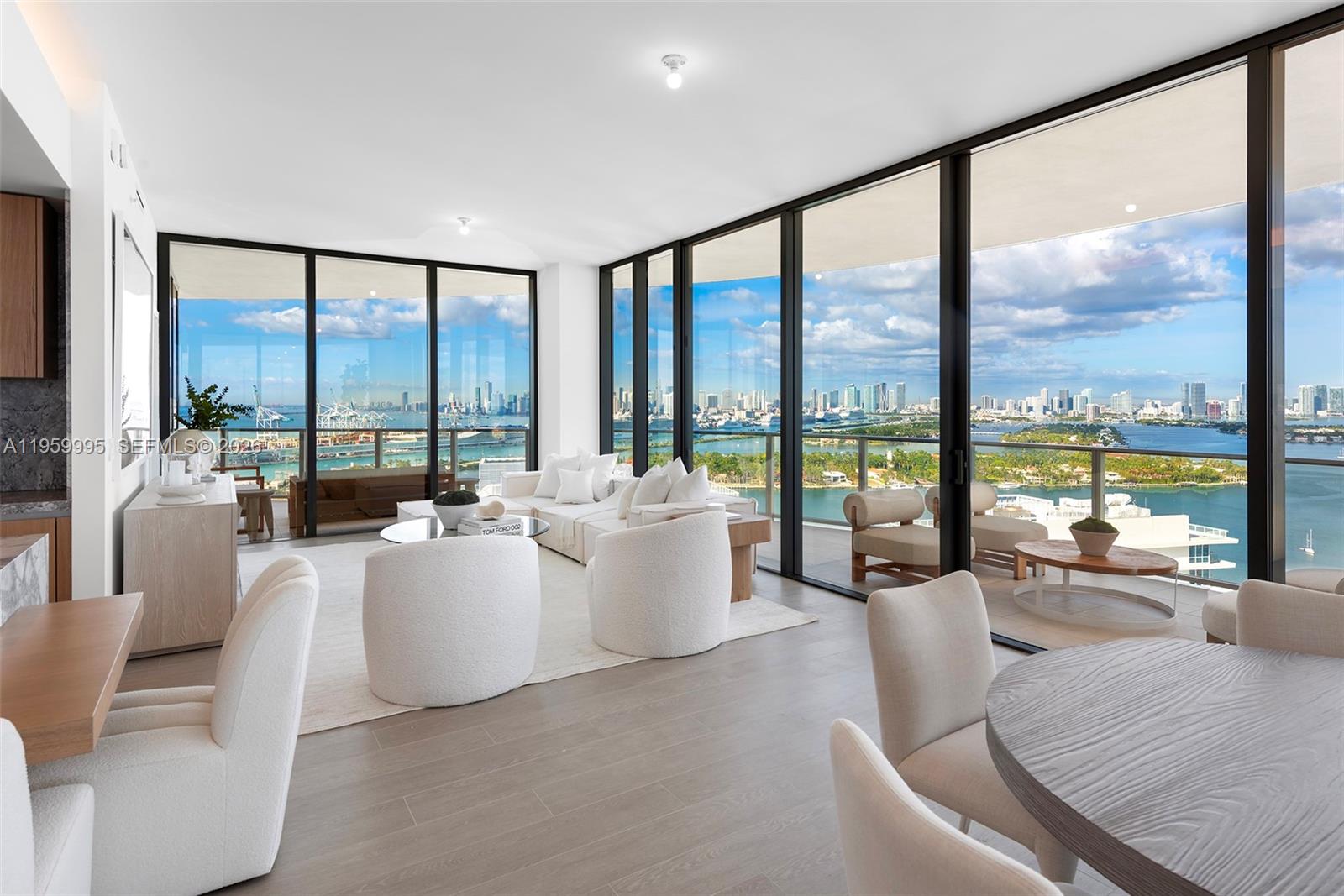 500 Alton Road, Unit 2903 Miami Beach, FL 33139 - Photo 3 of 52 a living room with furniture and a large window