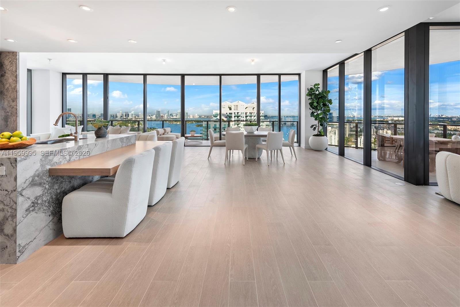 500 Alton Road, Unit 2903 Miami Beach, FL 33139 - Photo 5 of 52 a living room with furniture and a large window