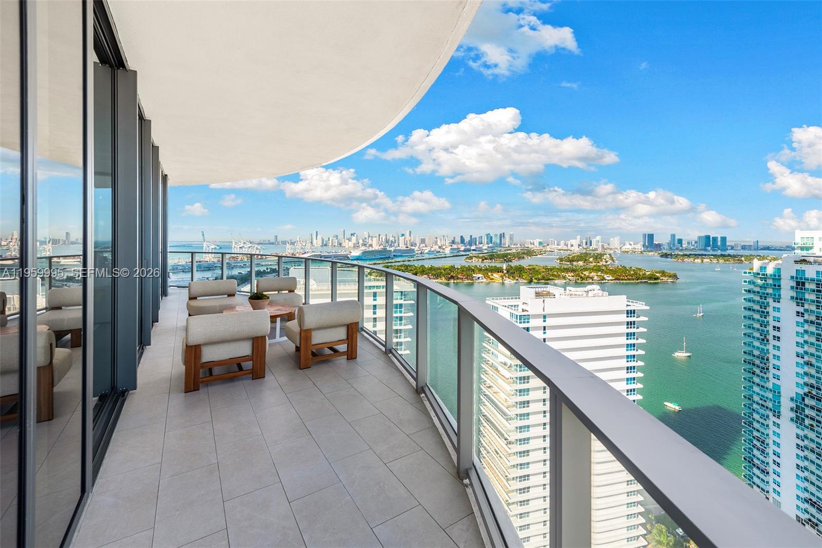 500 Alton Road, Unit 2903 Miami Beach, FL 33139 - Photo 7 of 52 a terrace with outdoor seating and city view
