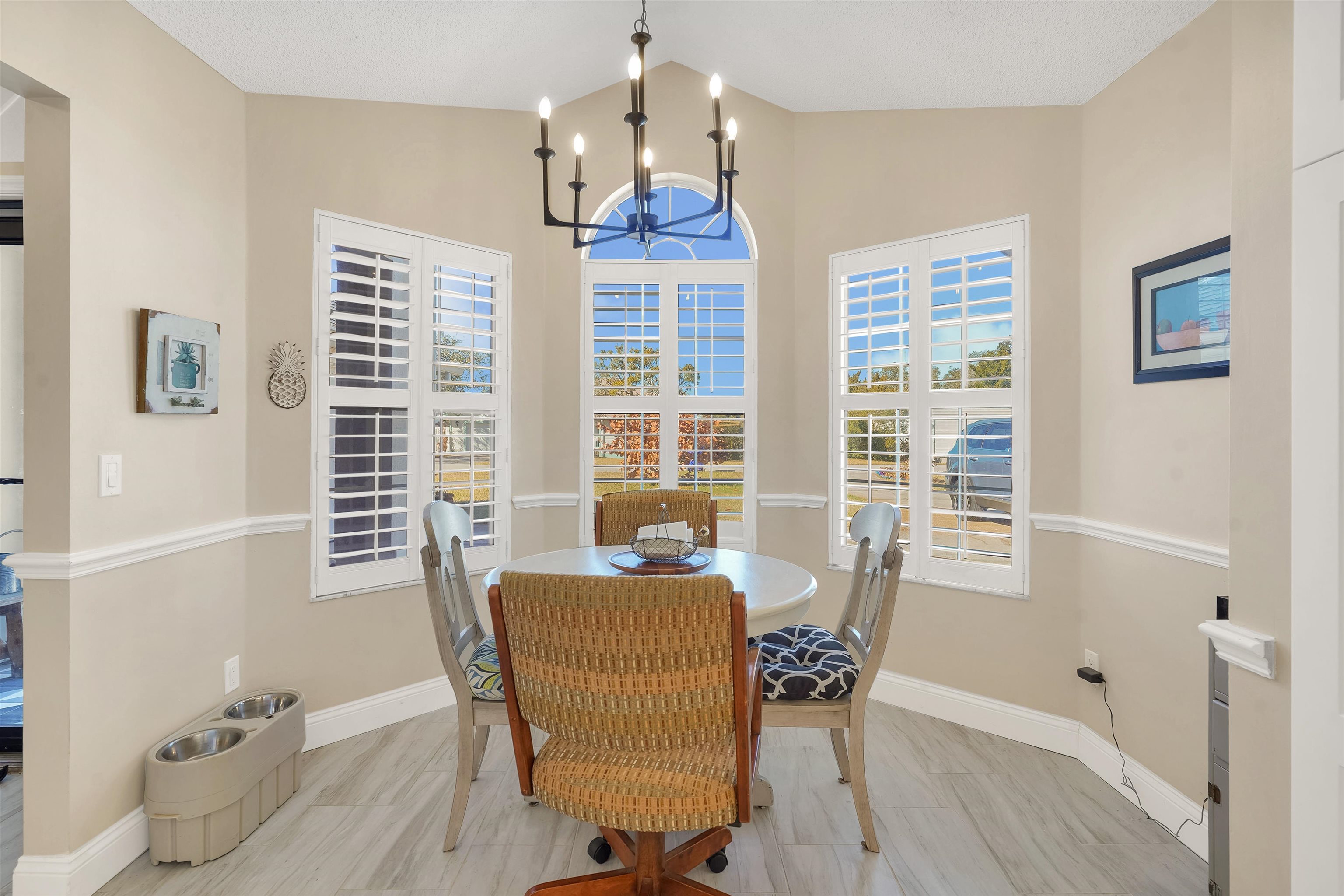 321 Mystical Way St. Augustine, FL 32080 - Photo 16 of 46 Dining space with hanging lights and lofted ceiling