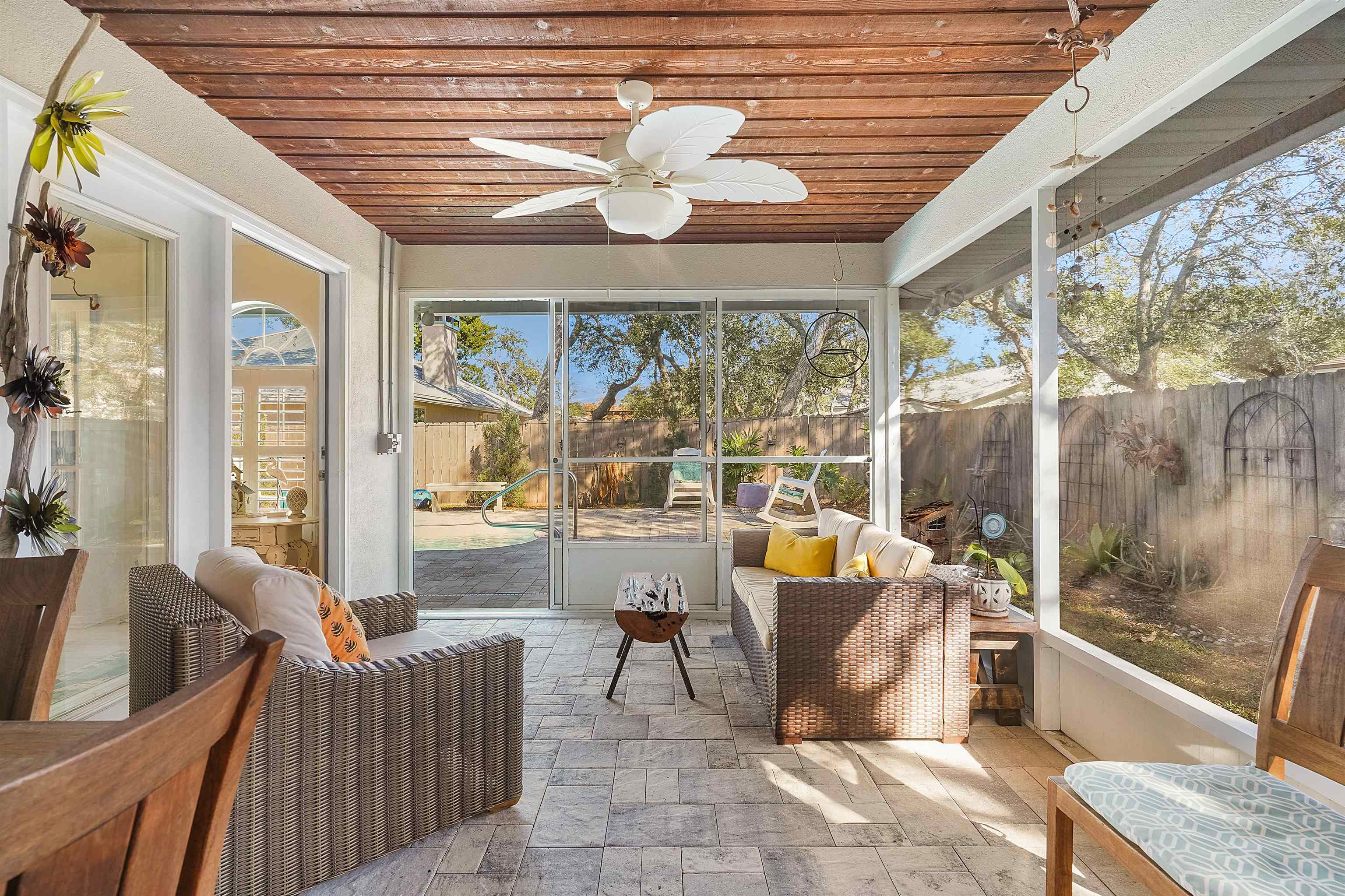 321 Mystical Way St. Augustine, FL 32080 - Photo 26 of 46 Sunroom / solarium with ceiling fan and outdoor lounge area