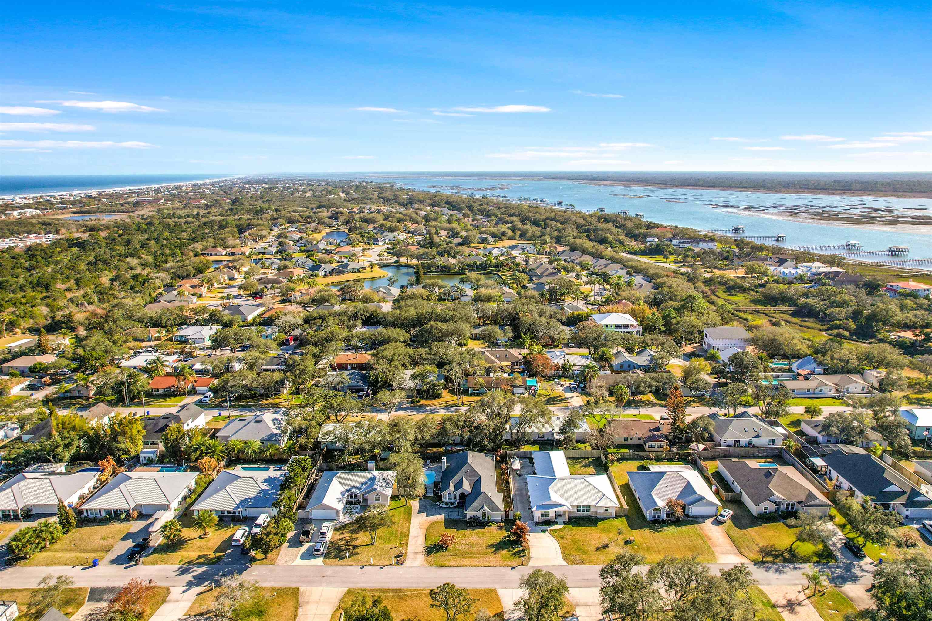 321 Mystical Way St. Augustine, FL 32080 - Photo 35 of 46 Aerial perspective of suburban area featuring a large body of water